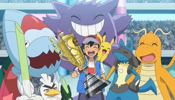 Ash com o troféu de campeão
